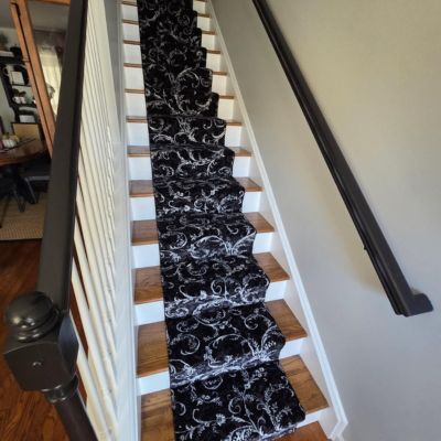 decorative stair runner installation in a Bethlehem, PA, home